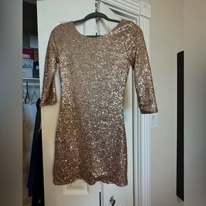 Gold sparkly long sleeve dress. Size 2